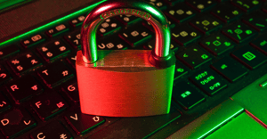 A locked padlock and a computer keyboard