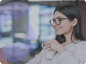Woman holding mug in office - round corners